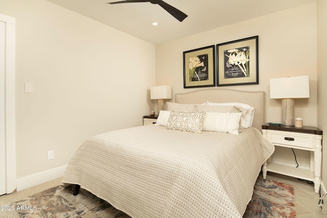 bedroom with tile patterned flooring and ceiling fan