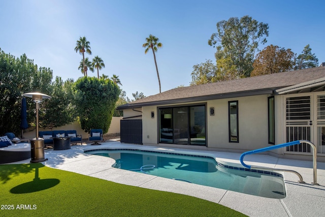 view of swimming pool with an outdoor hangout area and a patio area