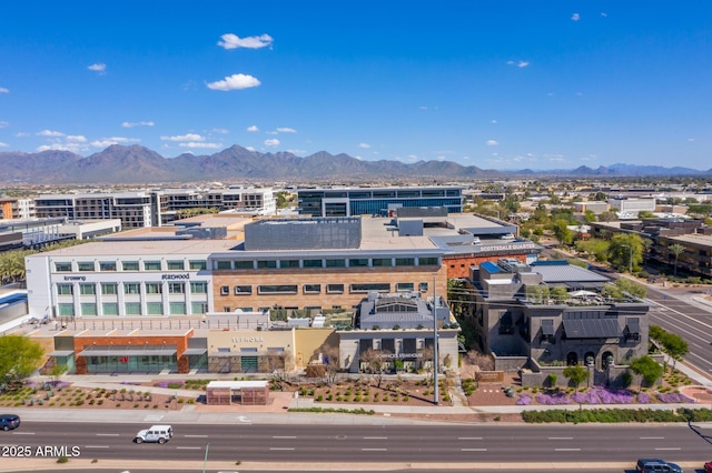 drone / aerial view featuring a mountain view