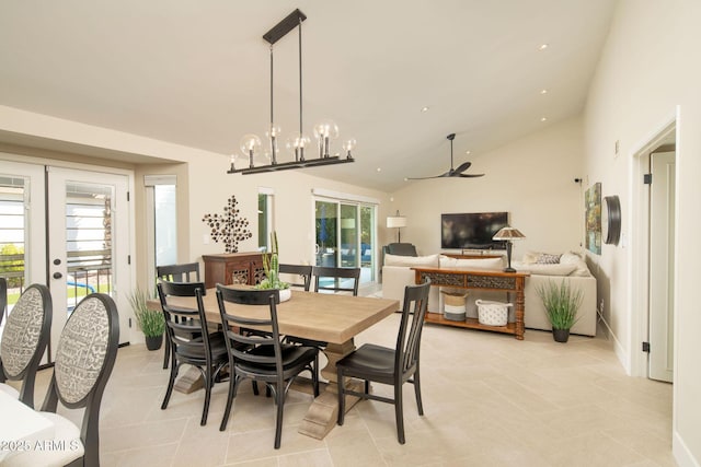 dining area with french doors, ceiling fan, and high vaulted ceiling