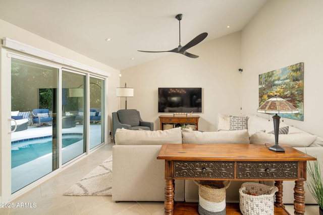 living room with vaulted ceiling and ceiling fan