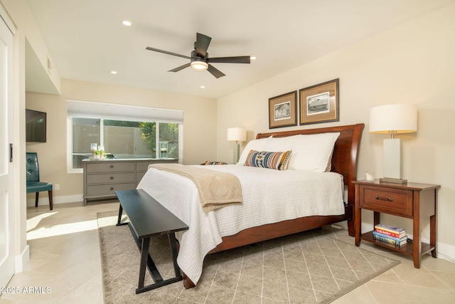 tiled bedroom with ceiling fan