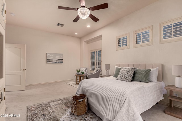 bedroom with light colored carpet and ceiling fan