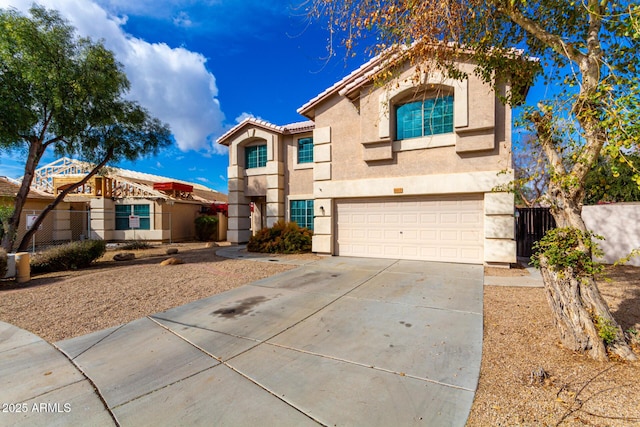 view of front of property with a garage