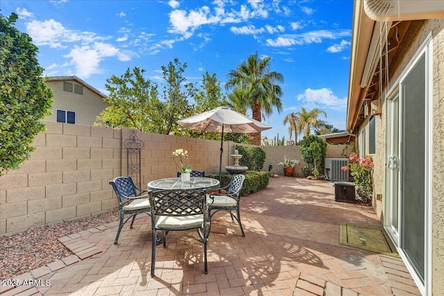 view of patio featuring central AC