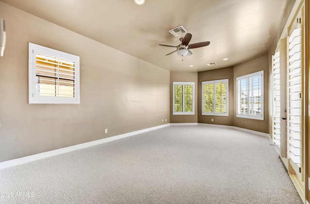 carpeted empty room with ceiling fan