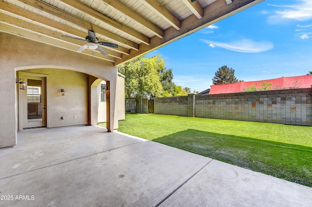 view of patio / terrace featuring ceiling fan
