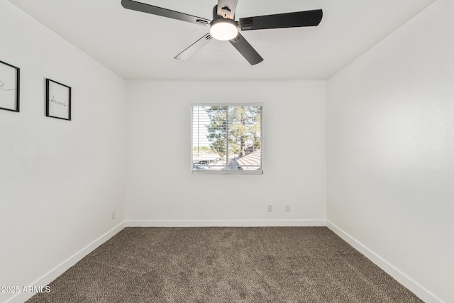 unfurnished room with carpet flooring, ceiling fan, and baseboards