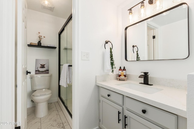 bathroom featuring a stall shower, marble finish floor, visible vents, and vanity