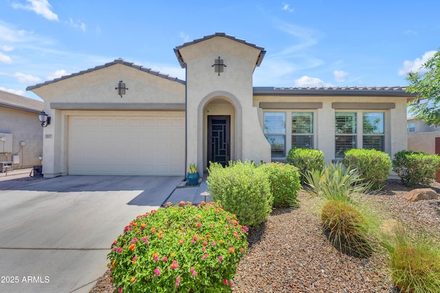 5637 S Parrish, Mesa, AZ 85212 - mediterranean / spanish-style house featuring stucco siding, a garage, driveway, and a tiled roof