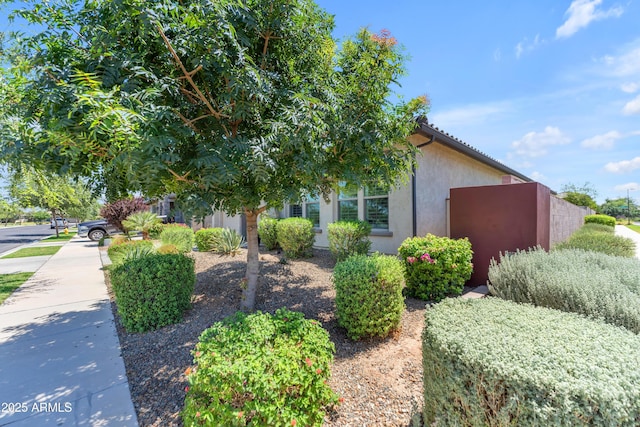 5637 S Parrish, Mesa, AZ 85212 - view of side of home featuring stucco siding