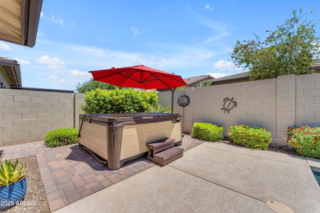 5637 S Parrish, Mesa, AZ 85212 - fenced backyard with a hot tub and a patio
