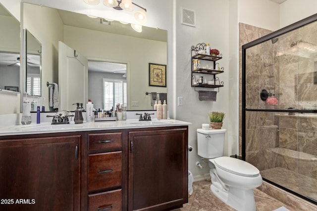7726 E Baseline Rd Unit 125, Mesa, AZ 85209 - bathroom featuring double vanity, ceiling fan, and a stall shower