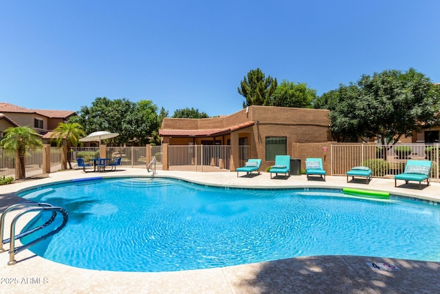 7726 E Baseline Rd Unit 125, Mesa, AZ 85209 - community pool featuring a patio