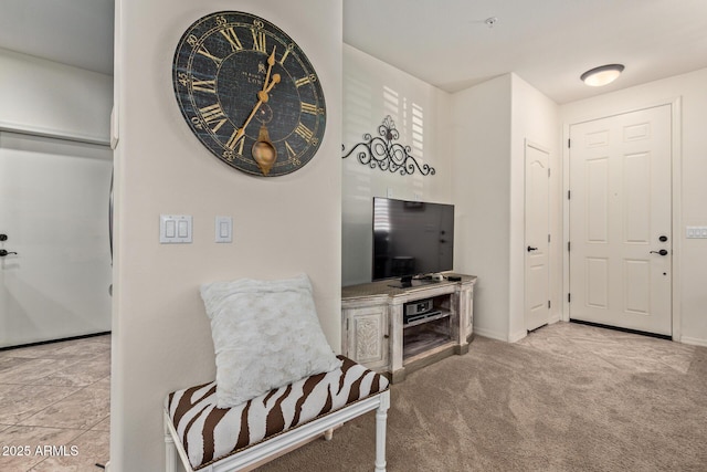 7726 E Baseline Rd Unit 125, Mesa, AZ 85209 - carpeted entryway featuring baseboards