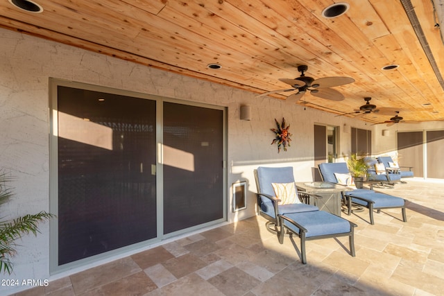 view of patio / terrace featuring ceiling fan