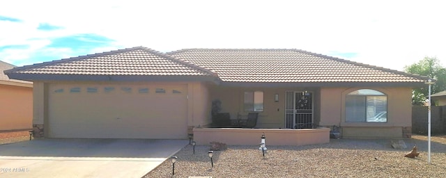 view of front of property with a garage