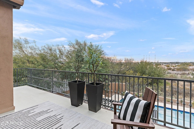 view of patio with a fenced in pool