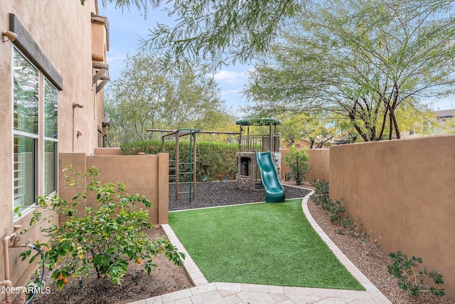 view of yard with a playground