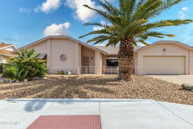 ranch-style house featuring a garage