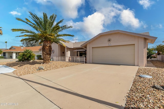 single story home featuring a garage