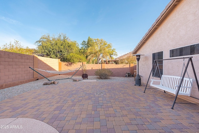 view of patio with a fenced backyard