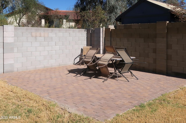 view of patio / terrace with fence