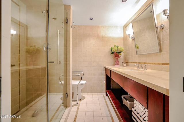 361 E Palm Ln, Phoenix, AZ 85004 - bathroom featuring tile walls, vanity, a stall shower, and tile patterned flooring