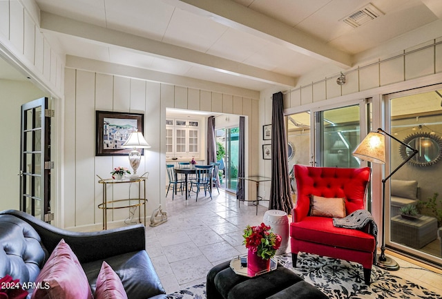 361 E Palm Ln, Phoenix, AZ 85004 - living area featuring stone tile floors and beam ceiling