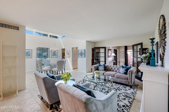 361 E Palm Ln, Phoenix, AZ 85004 - living area featuring a chandelier and stone tile floors