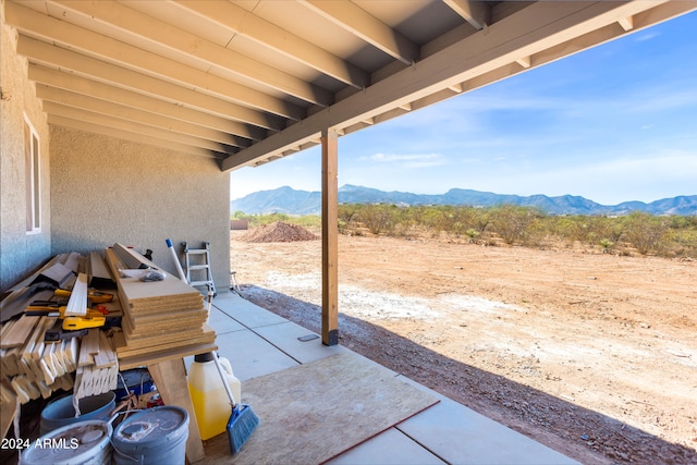 view of patio / terrace with a mountain view