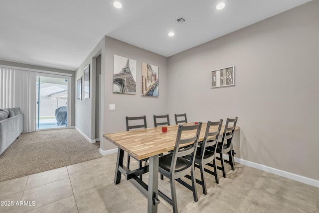 38150 W San Sisto Ave, Maricopa, AZ 85138 - dining space with baseboards, recessed lighting, light colored carpet, and light tile patterned floors