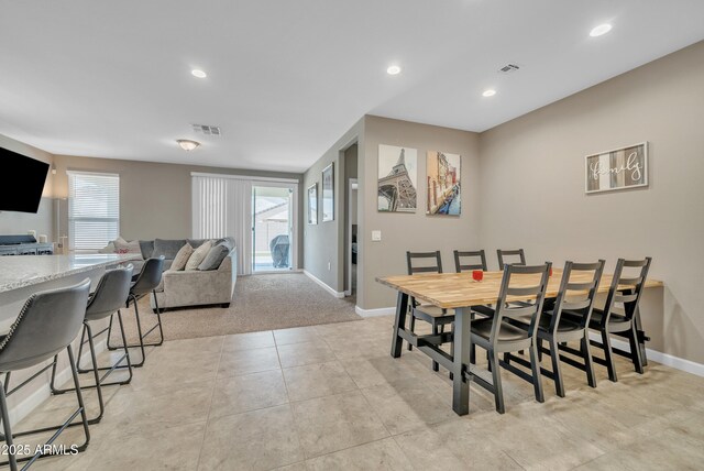 38150 W San Sisto Ave, Maricopa, AZ 85138 - dining space with baseboards, light colored carpet, light tile patterned floors, and recessed lighting