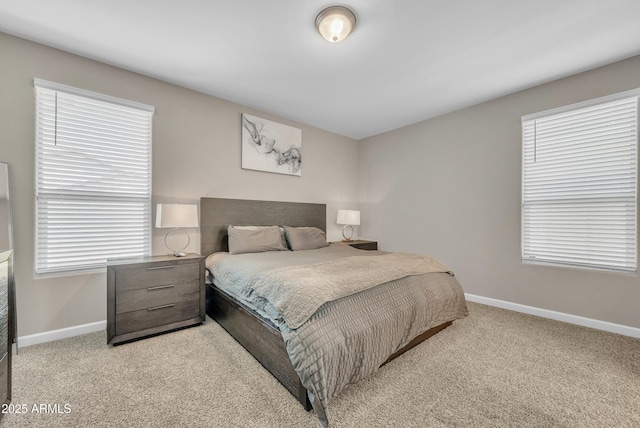 38150 W San Sisto Ave, Maricopa, AZ 85138 - bedroom featuring baseboards and light carpet