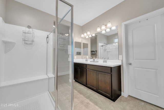 38150 W San Sisto Ave, Maricopa, AZ 85138 - full bath with a stall shower, tile patterned floors, and double vanity