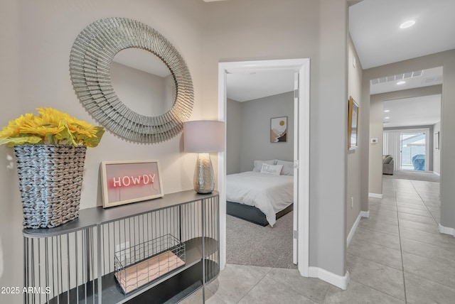 38150 W San Sisto Ave, Maricopa, AZ 85138 - hallway featuring tile patterned flooring and baseboards