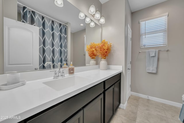 38150 W San Sisto Ave, Maricopa, AZ 85138 - full bath with baseboards, vanity, tile patterned floors, and a shower with shower curtain