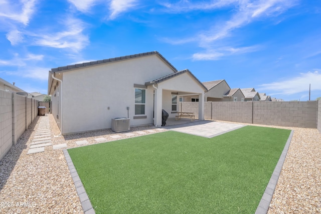 38150 W San Sisto Ave, Maricopa, AZ 85138 - back of property with stucco siding, a patio area, and central AC unit