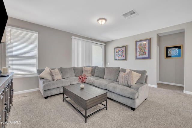 38150 W San Sisto Ave, Maricopa, AZ 85138 - living area featuring light carpet and baseboards