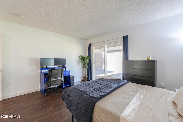 bedroom featuring access to exterior, a textured ceiling, baseboards, and wood finished floors