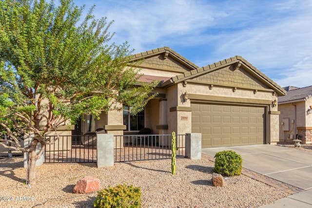 view of front of property featuring a garage