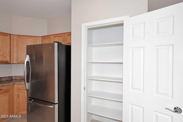 kitchen with stainless steel refrigerator