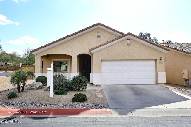 view of front of home with a garage