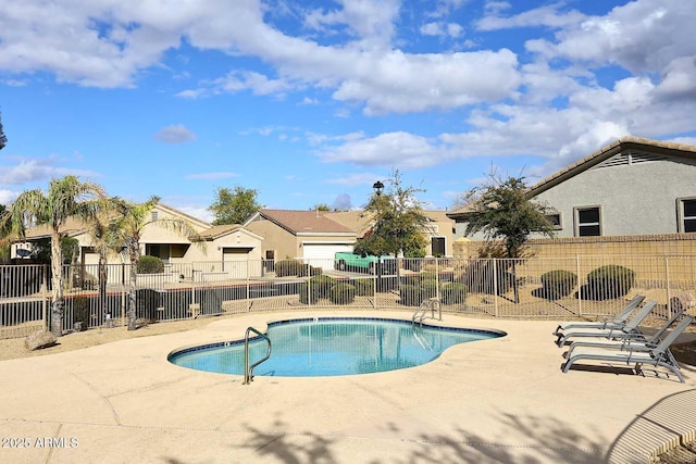 view of pool featuring a patio area