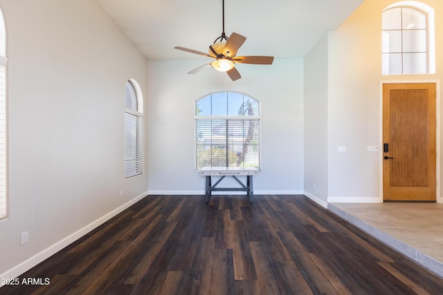 1694 E Campbell Ave, Gilbert, AZ 85234 - empty room with dark wood finished floors, ceiling fan, and baseboards
