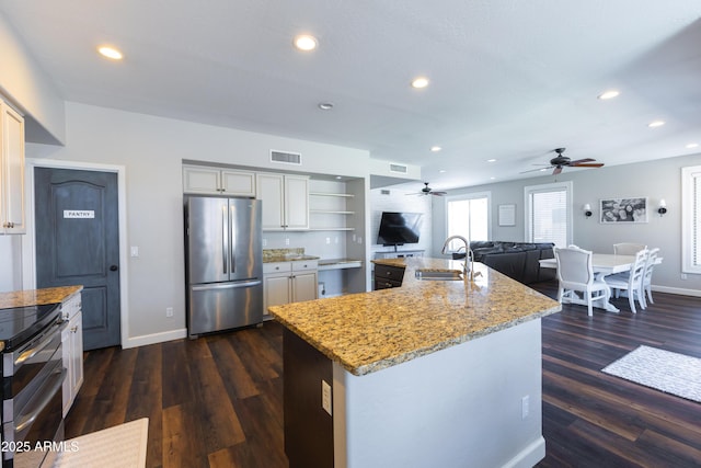 1694 E Campbell Ave, Gilbert, AZ 85234 - kitchen with stainless steel appliances, a sink, recessed lighting, a ceiling fan, and light stone counters