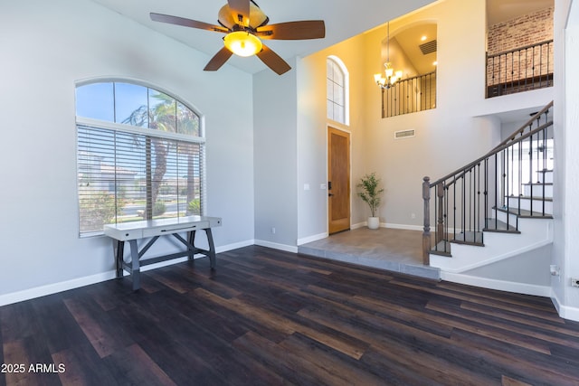 1694 E Campbell Ave, Gilbert, AZ 85234 - foyer with wood finished floors, stairs, baseboards, and a towering ceiling