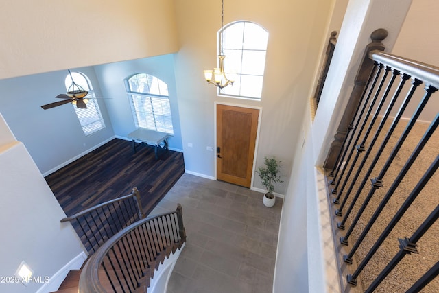 1694 E Campbell Ave, Gilbert, AZ 85234 - tiled foyer entrance with stairway, a high ceiling, baseboards, a chandelier, and ceiling fan