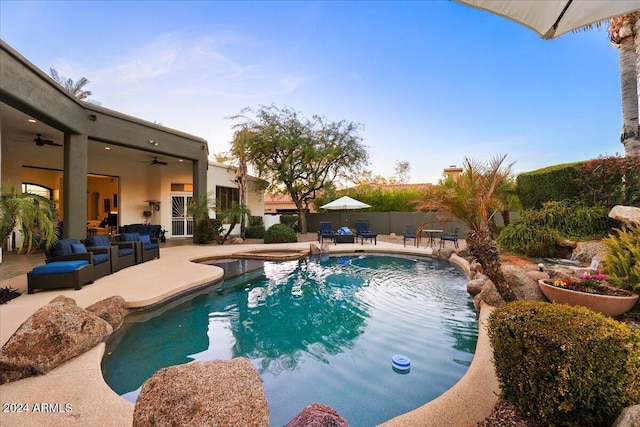 view of pool featuring an outdoor hangout area, a patio area, ceiling fan, and an in ground hot tub