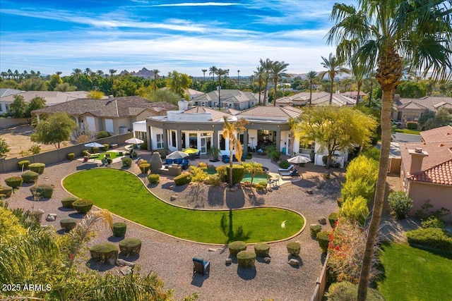 exterior space featuring a patio and a lawn